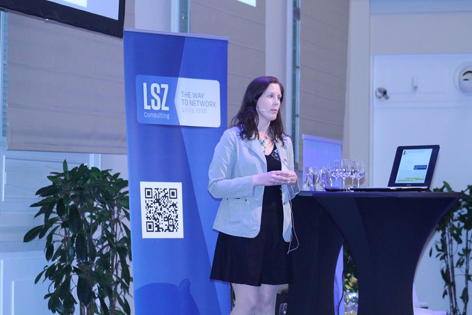 Photo: Sabrina on the podium of LSZ Consulting's conference on ‘The Digital Enterprise’